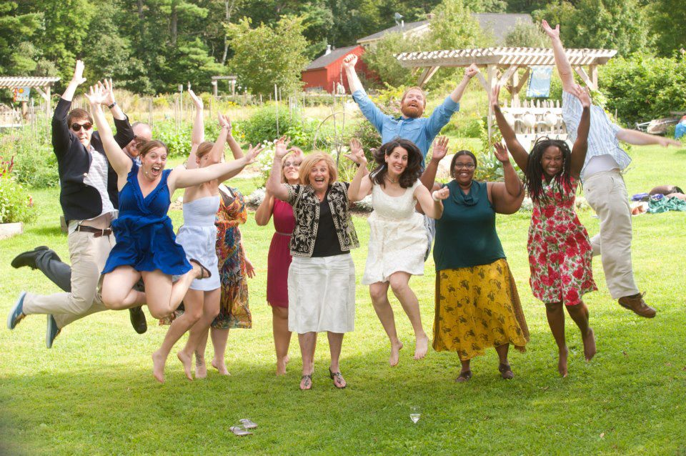 a group of people jumping in the air